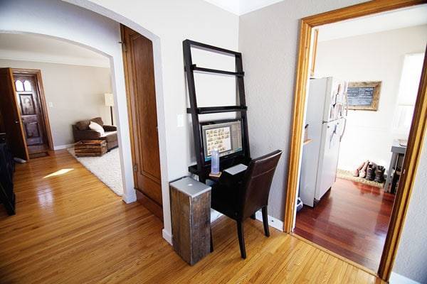 Doorways to a living room and a kitchen.