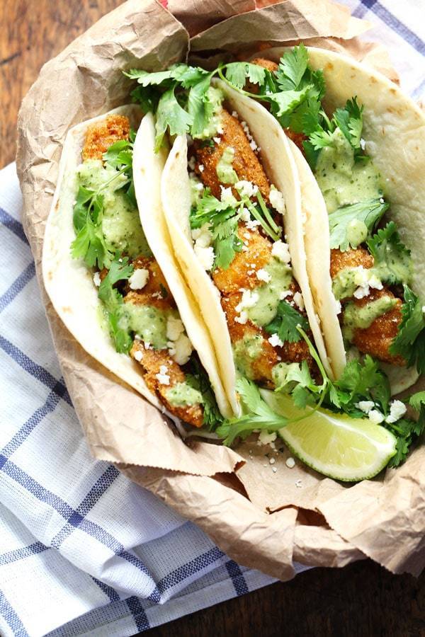 Crispy Fish Tacos with Jalapeño Sauce in a bowl.