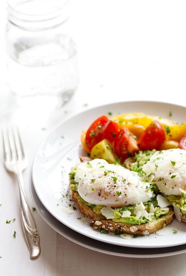 This Simple Poached Egg and Avocado Toast recipe is so simple and so delicious! Real, healthy food never tasted so good. YUM! | pinchofyum.com