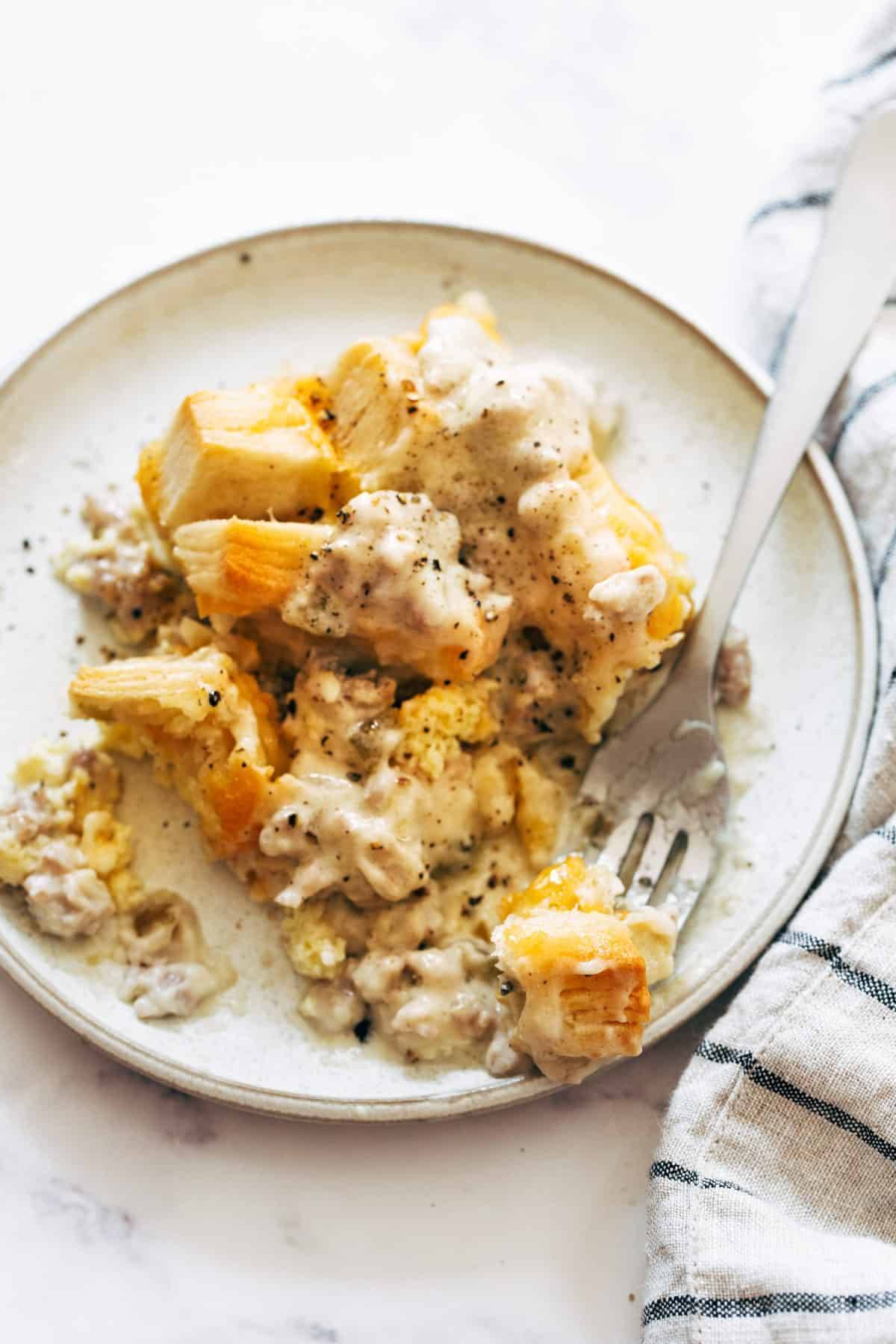 Biscuits and gravy egg bake on a plate.