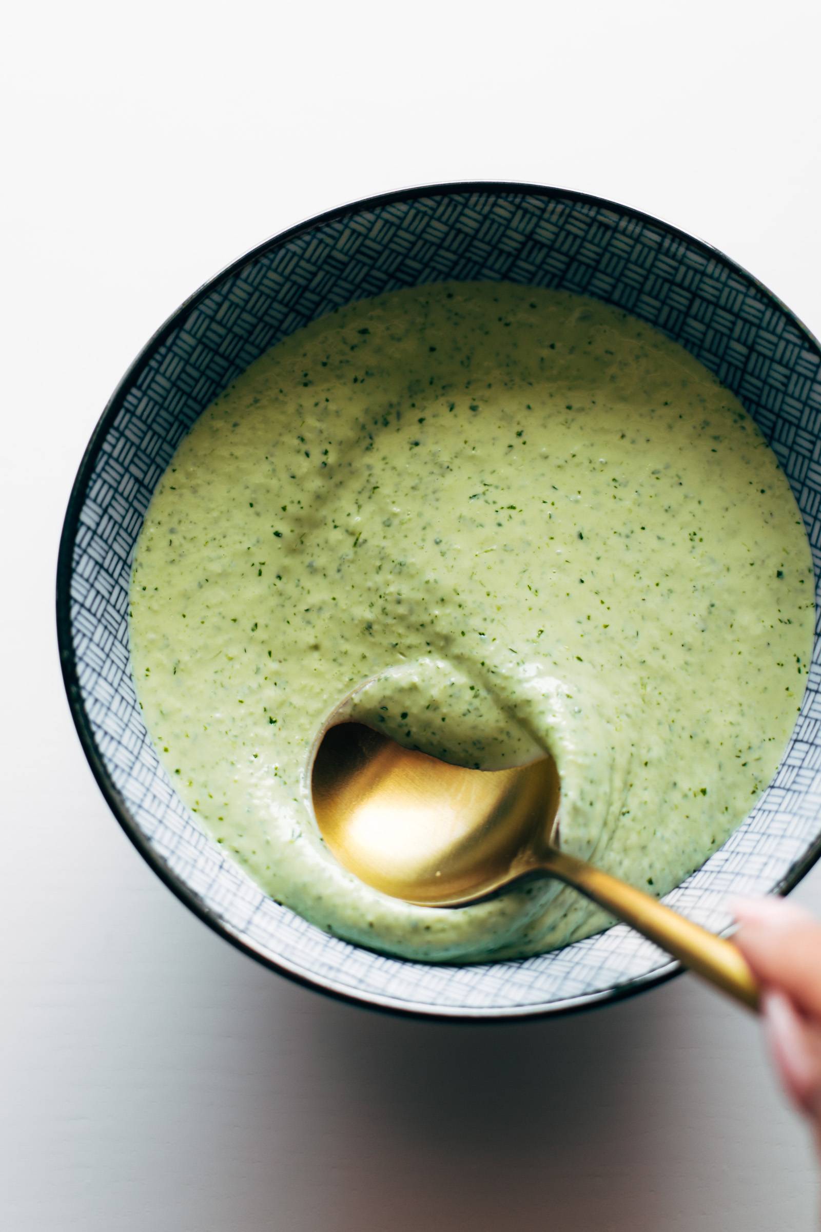 Aji verde in a bowl with a spoon