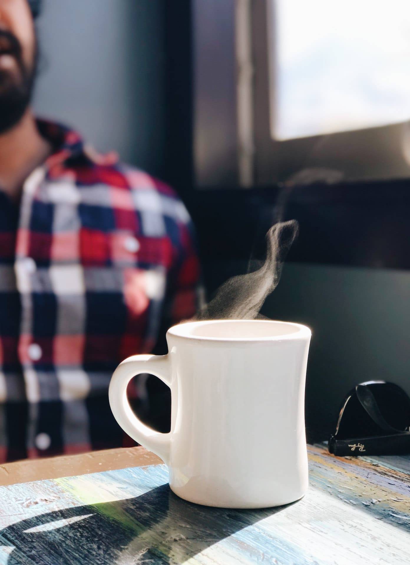 Steaming coffee cup.