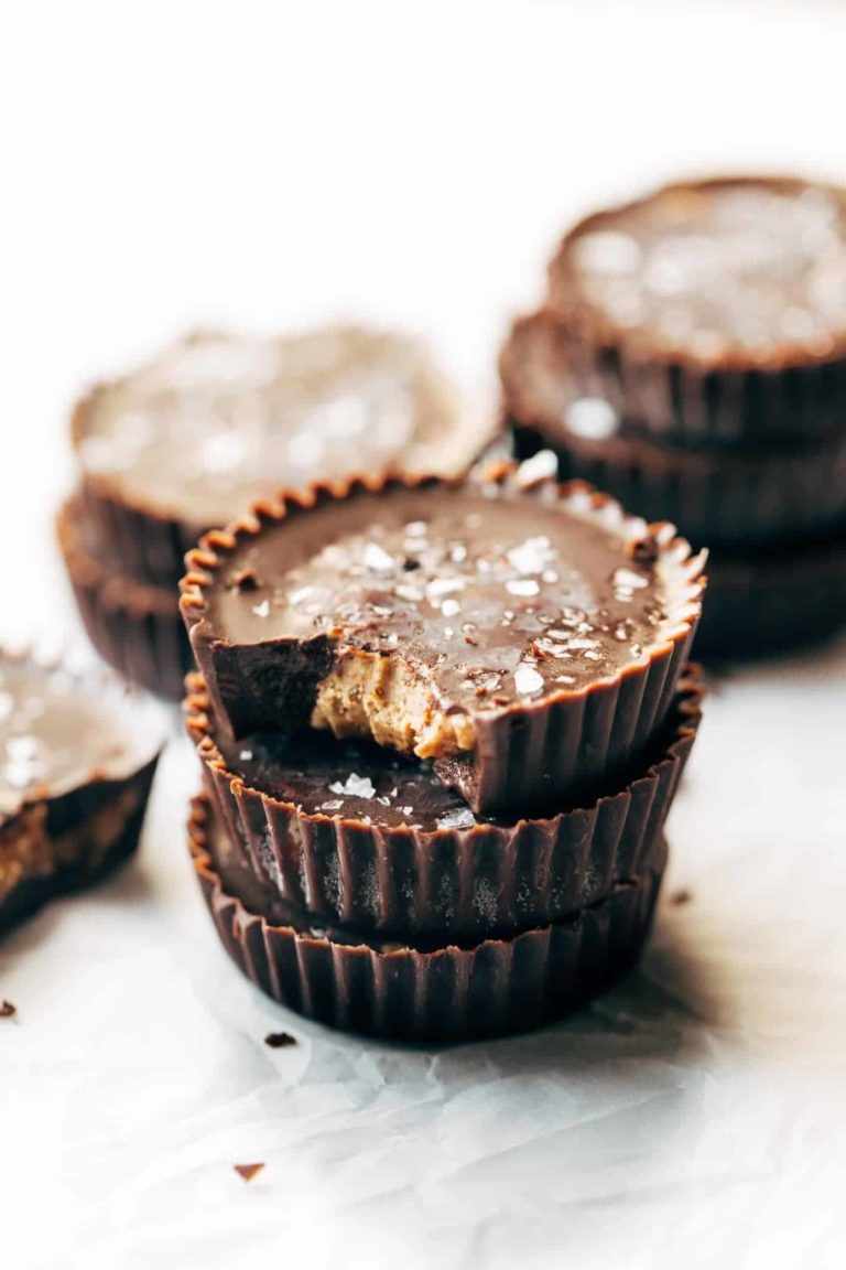 Stack of three almond butter cups.