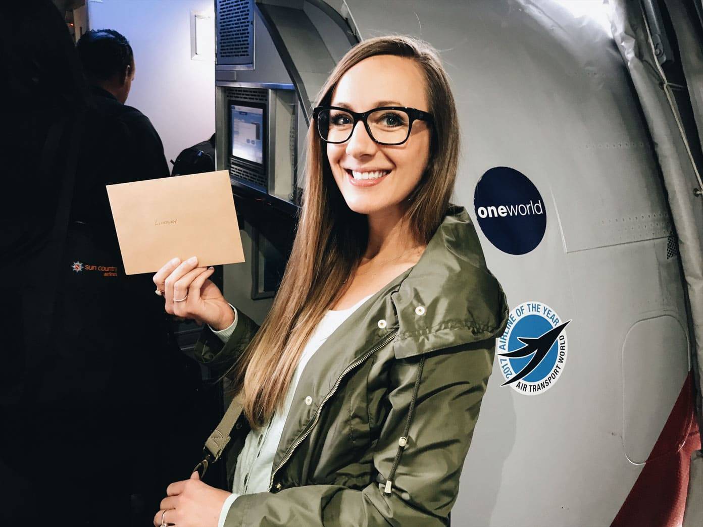 Woman boarding an airplane.