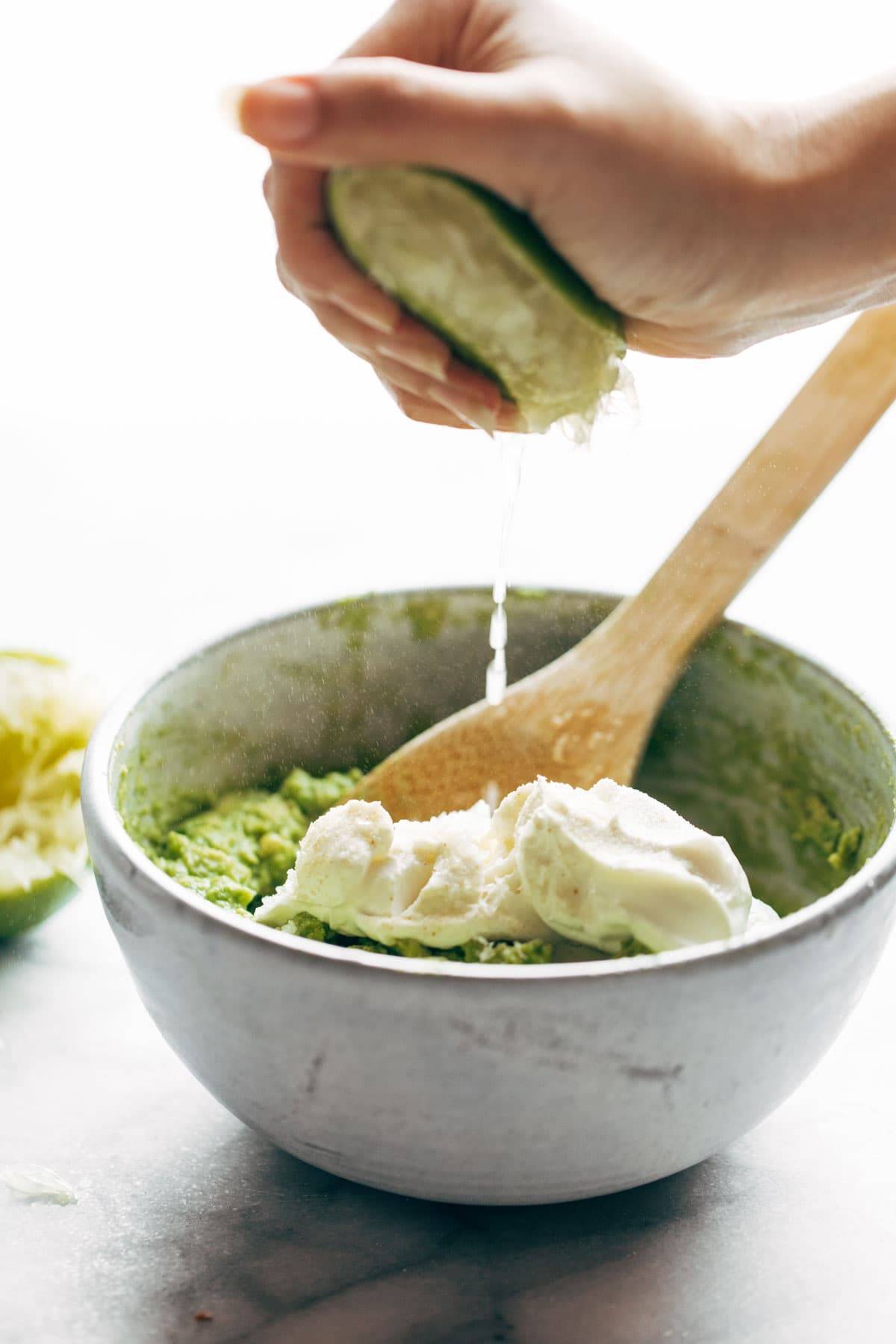 Lime juice squeezed into Creamy Avocado Dip.