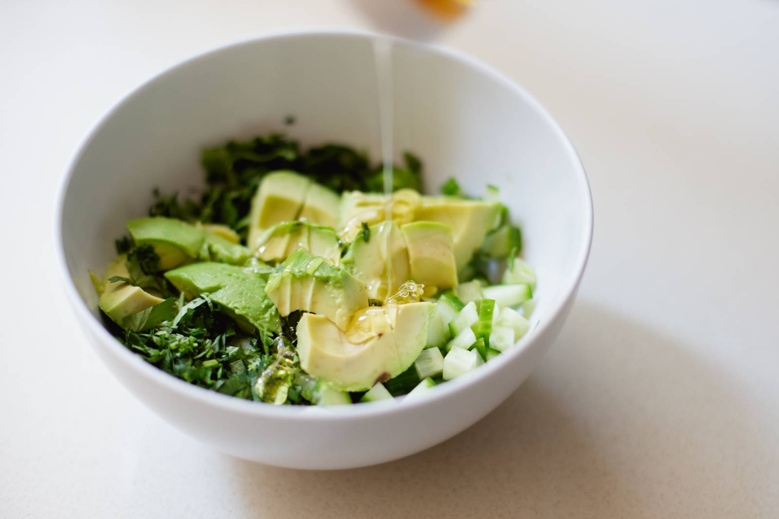 Cucumber avocado salsa in a bowl.