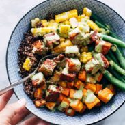 Cubed tofu and veggies arranged on a plate.