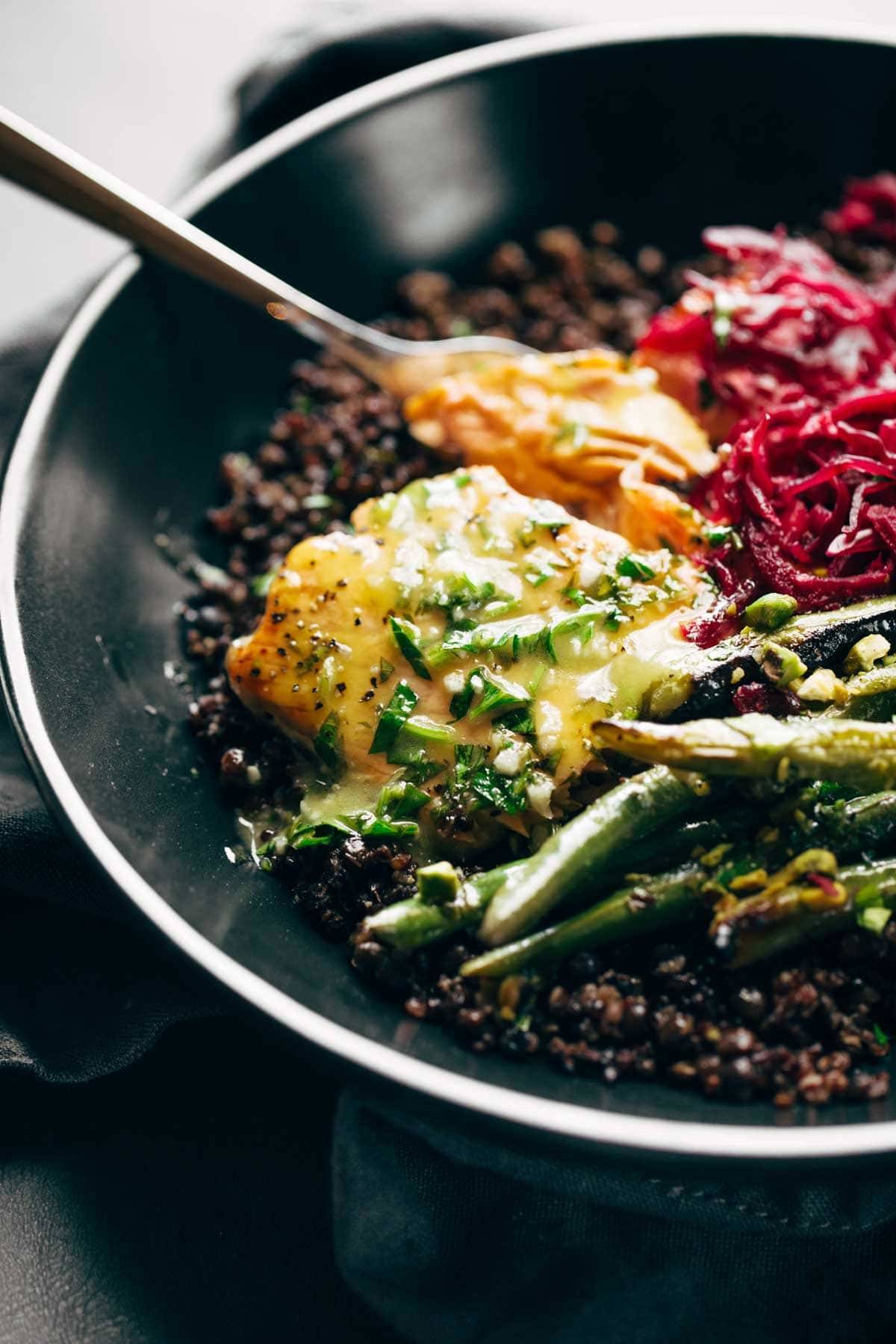 Baked Salmon with Lentils, vegetables and Lemon Herb Sauce.