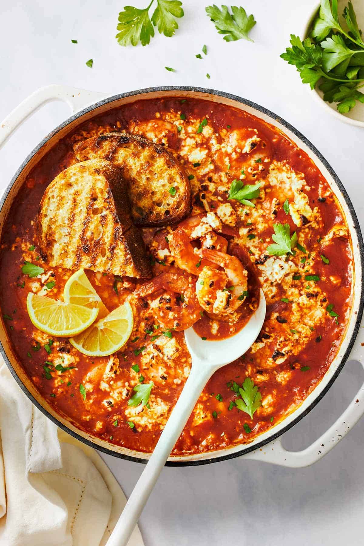 Baked shrimp with feta in a dutch oven.