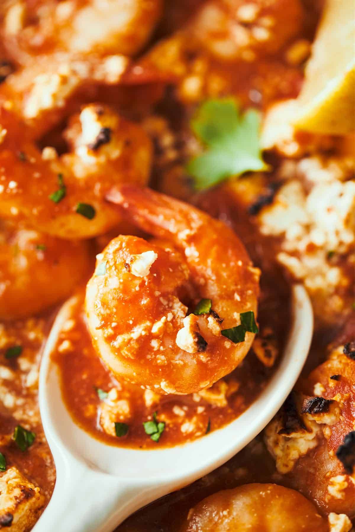 Shrimp in sauce with feta.