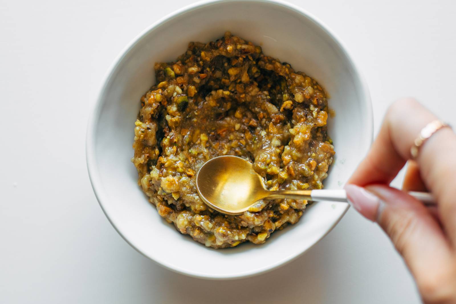 Ground up butter, nuts, and sugar in a bowl