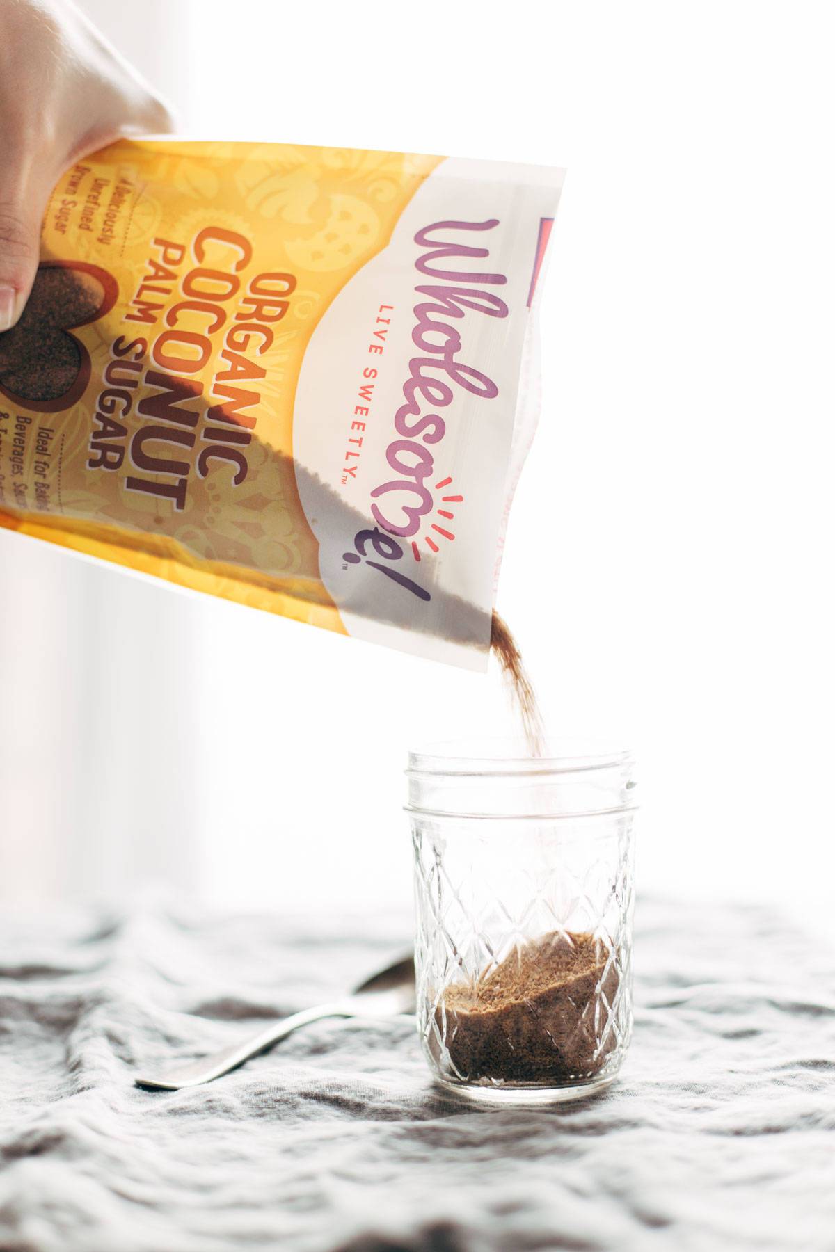 Jar of organic coconut palm sugar.