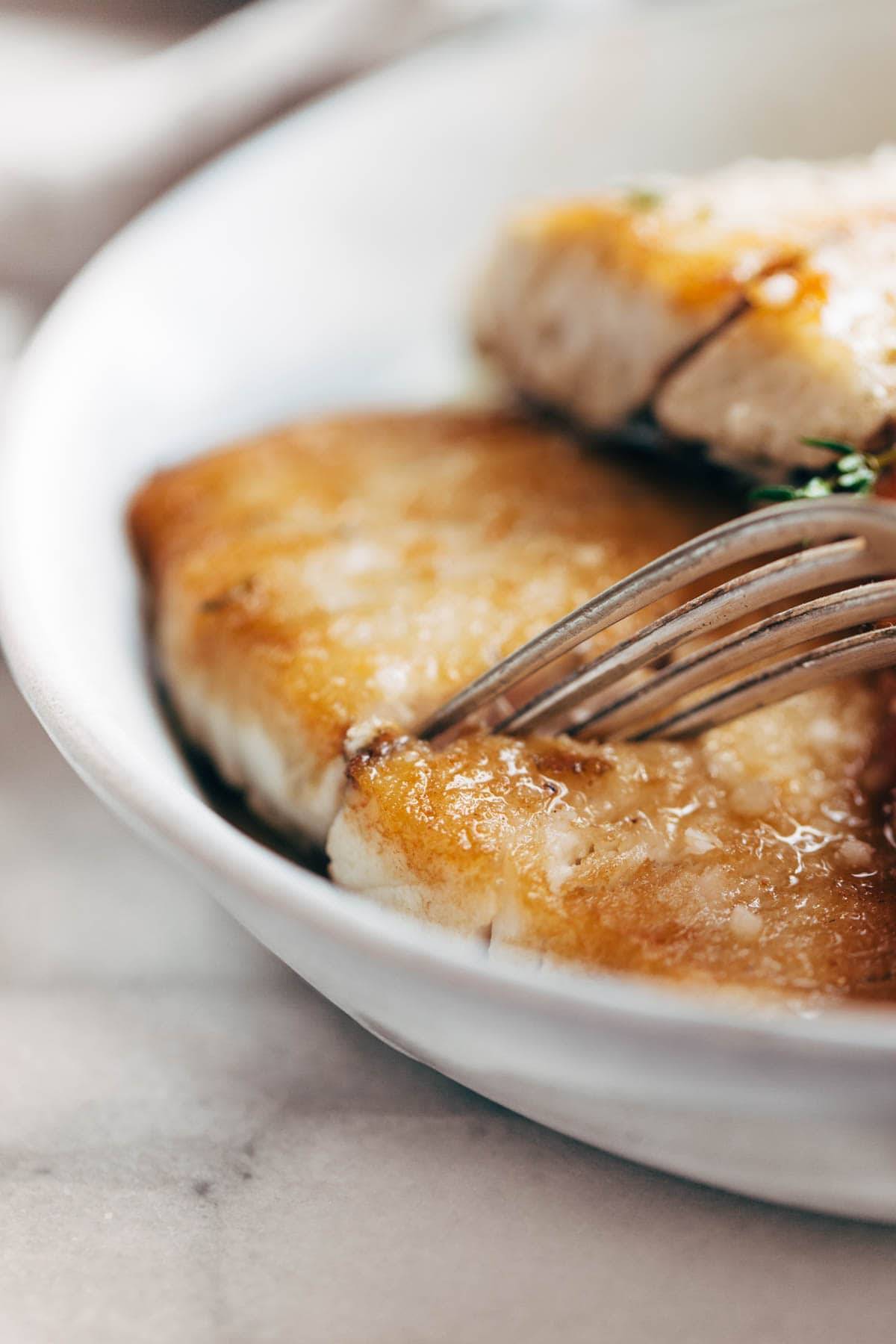 Pan Fried Barramundi with a fork