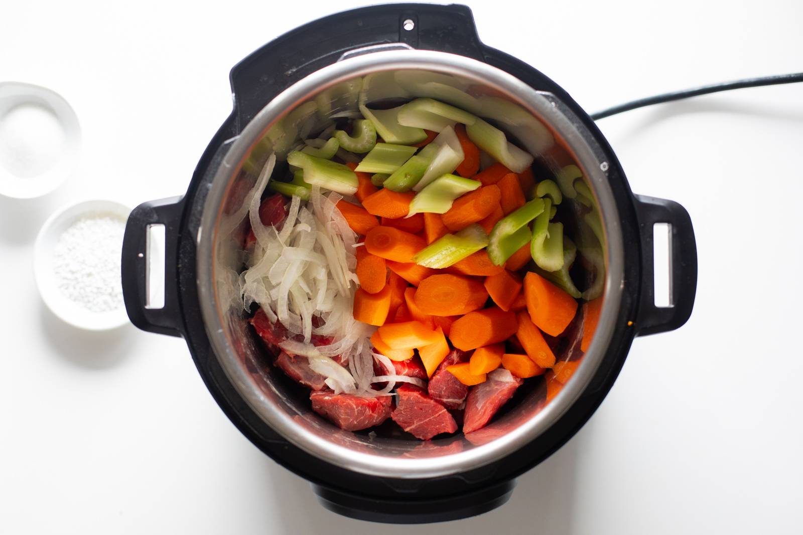 Ingredients for beef stew in the Instant Pot.