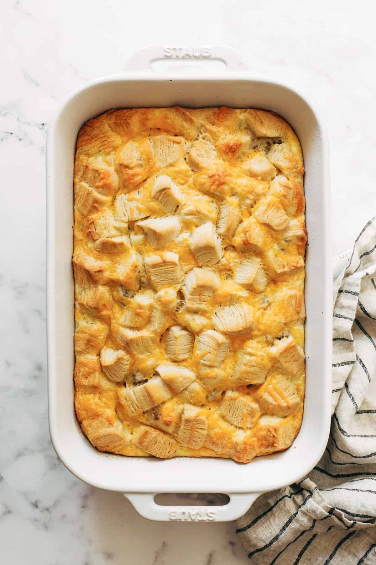 Baked biscuits and gravy in a casserole dish.