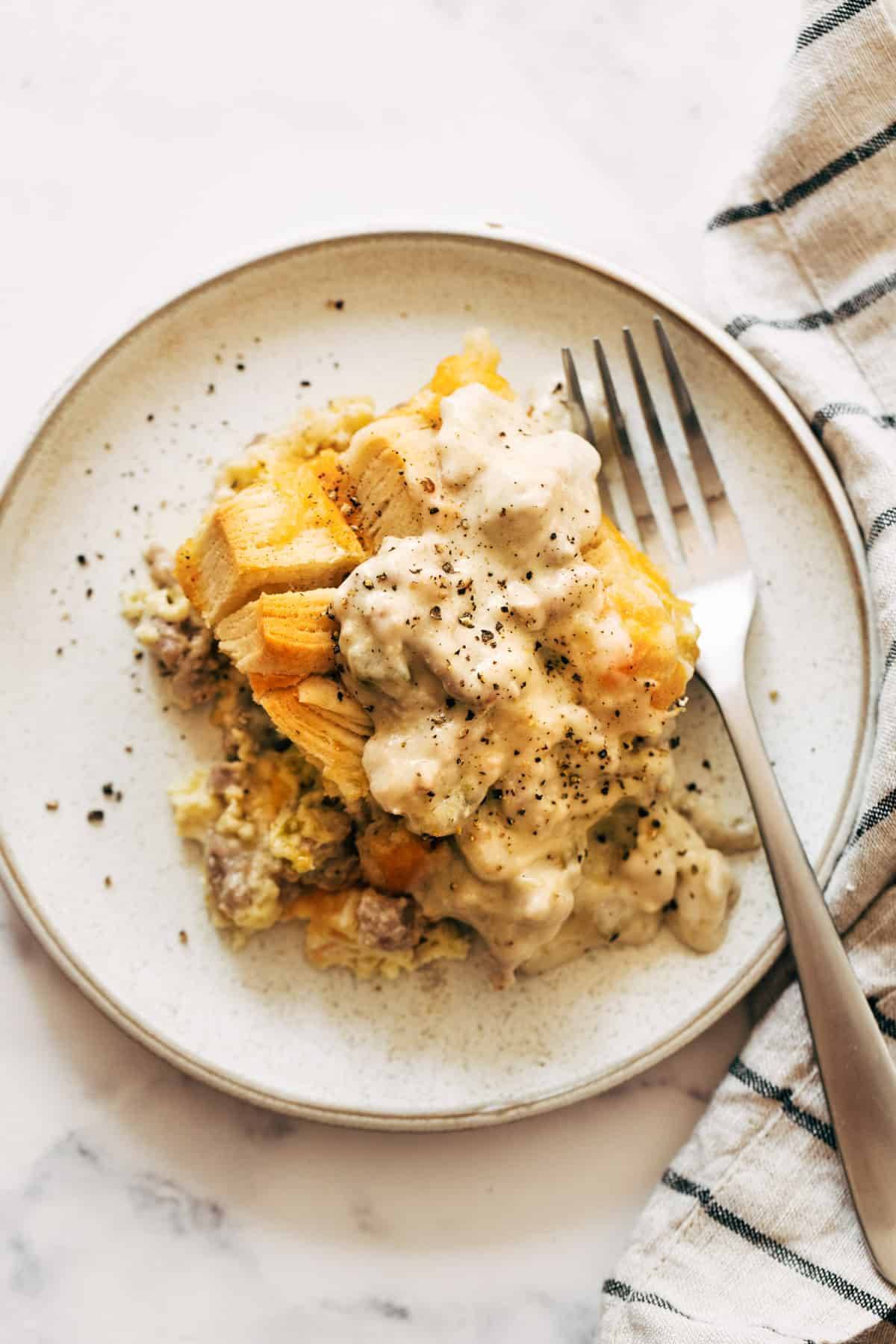 Biscuits and gravy egg bake served on a plate.