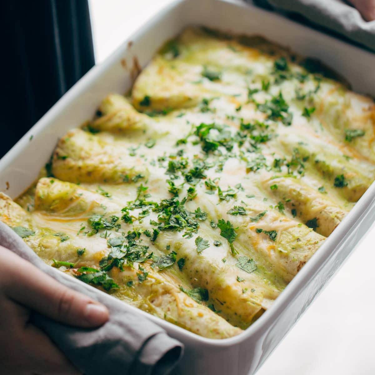 Breakfast enchiladas in a pan.