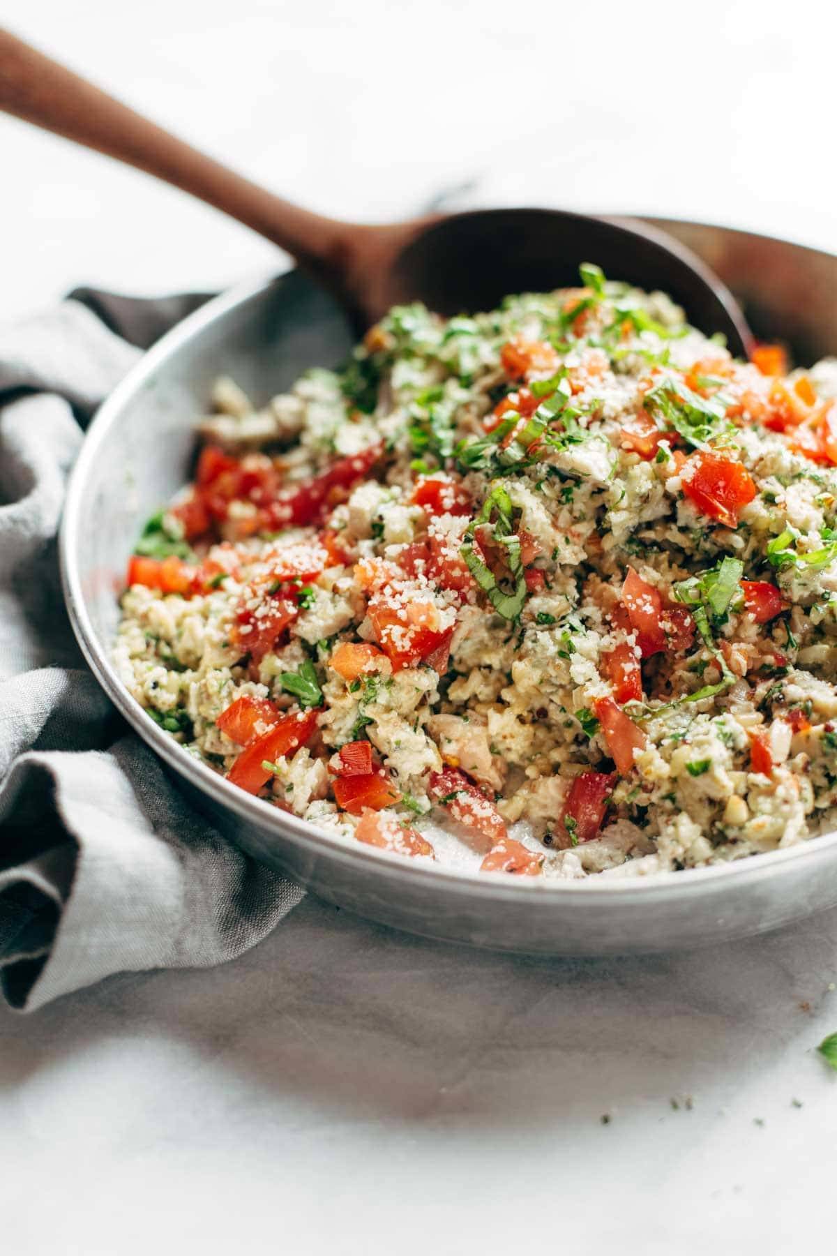 Garlic Herb Chicken Salad in a bowl with a spoon.