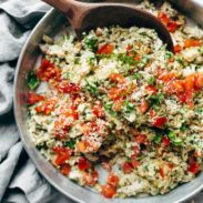 Healthy Chicken Salad in a serving bowl with wooden spoon.