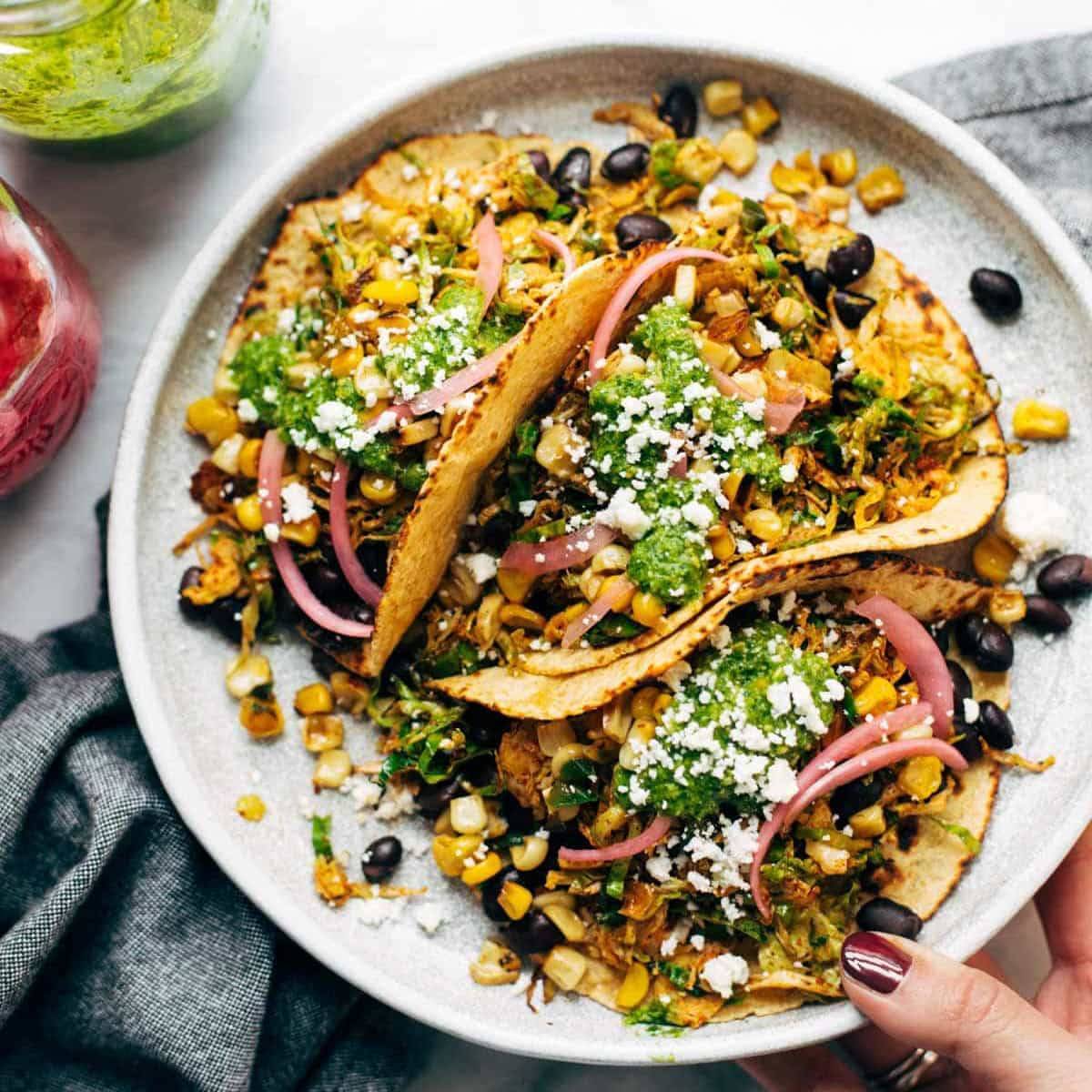 Brussels sprouts tacos on plate.