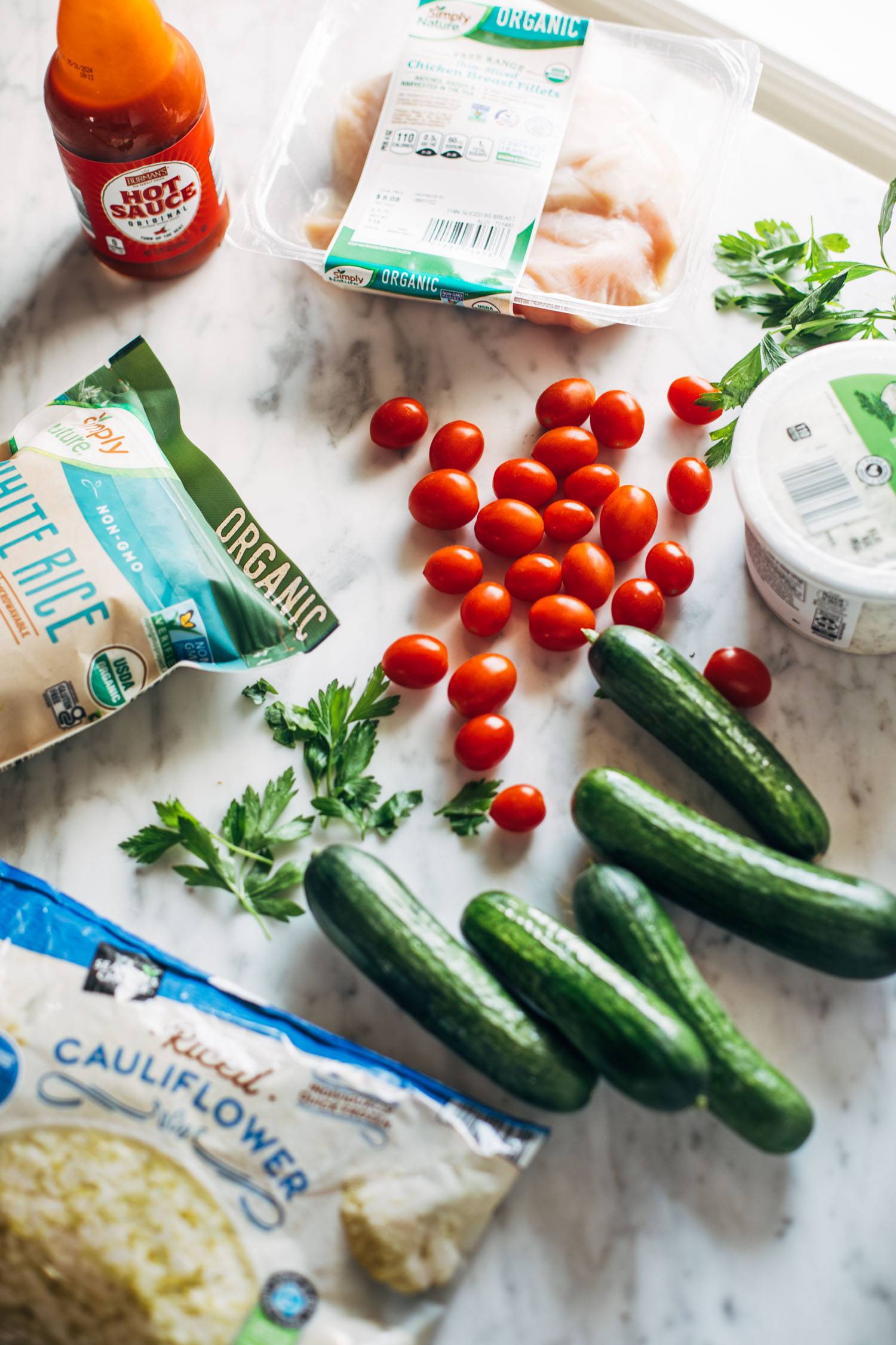 ALDI ingredients for buffalo chicken bowls on a table.