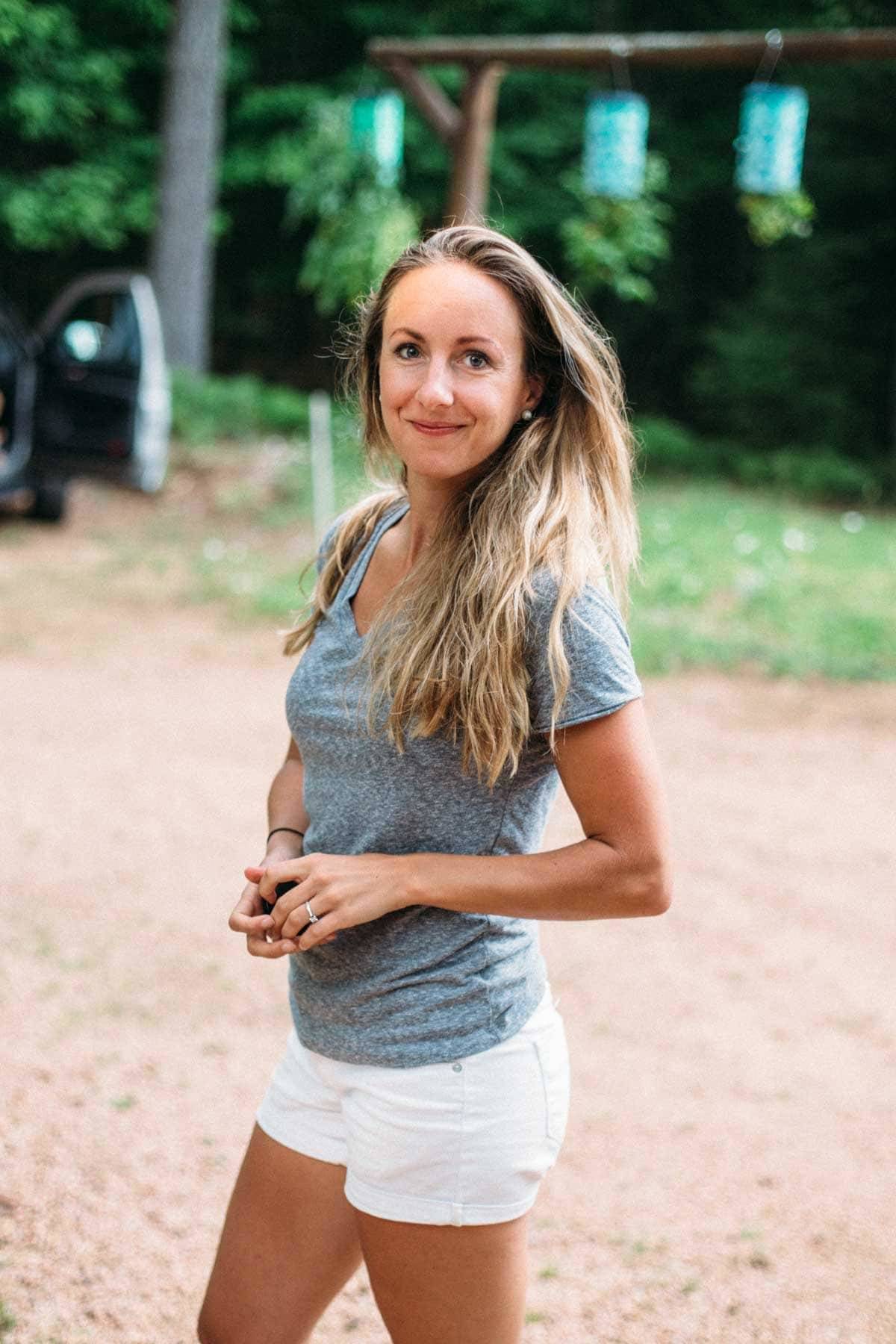 Woman smiling at camera.