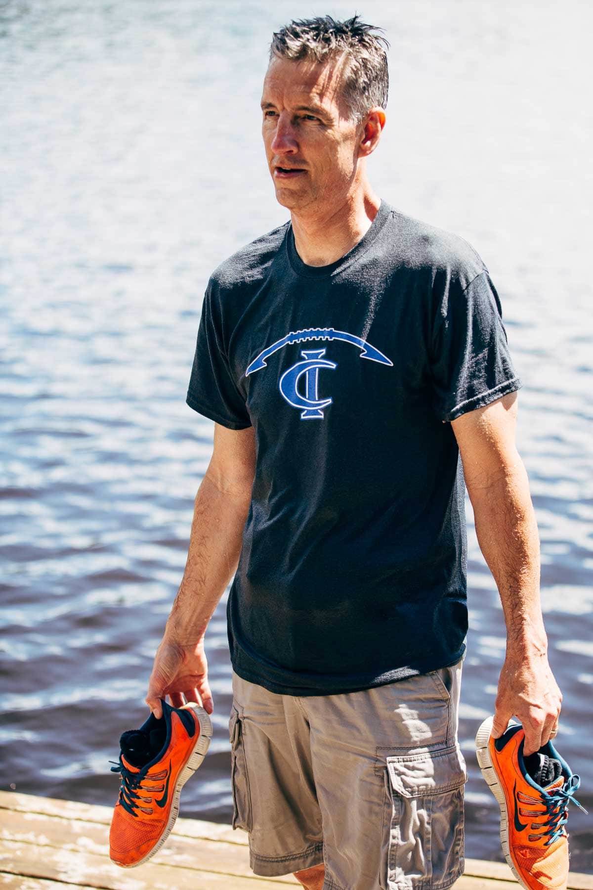 Man standing on a dock.