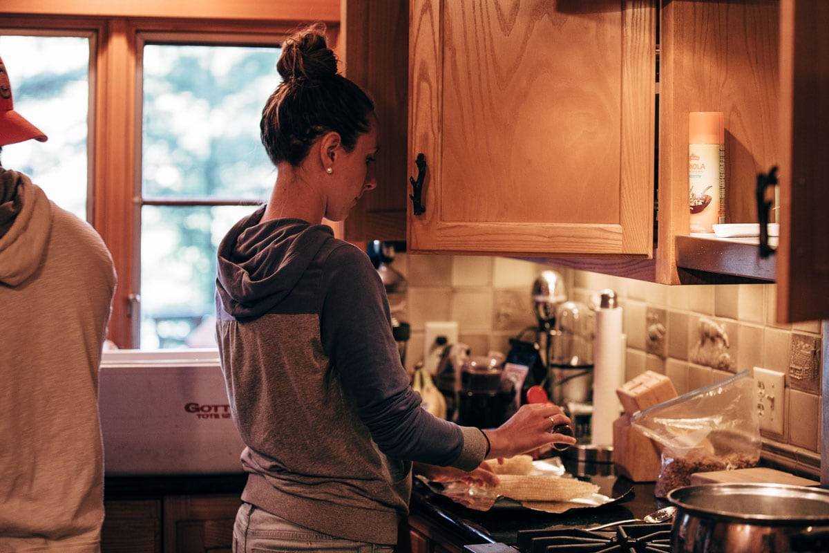 Woman cooking in a kitchen.