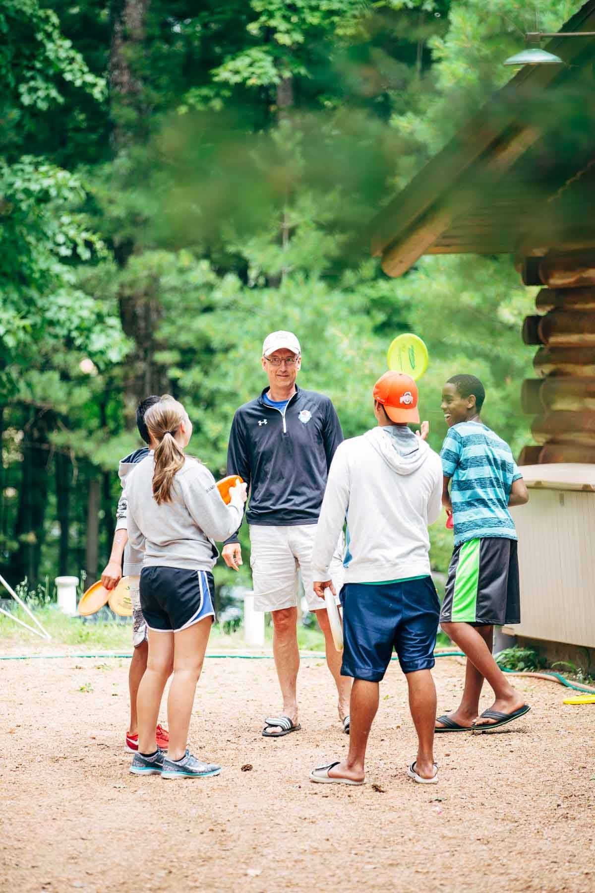 People playing at a cabin.