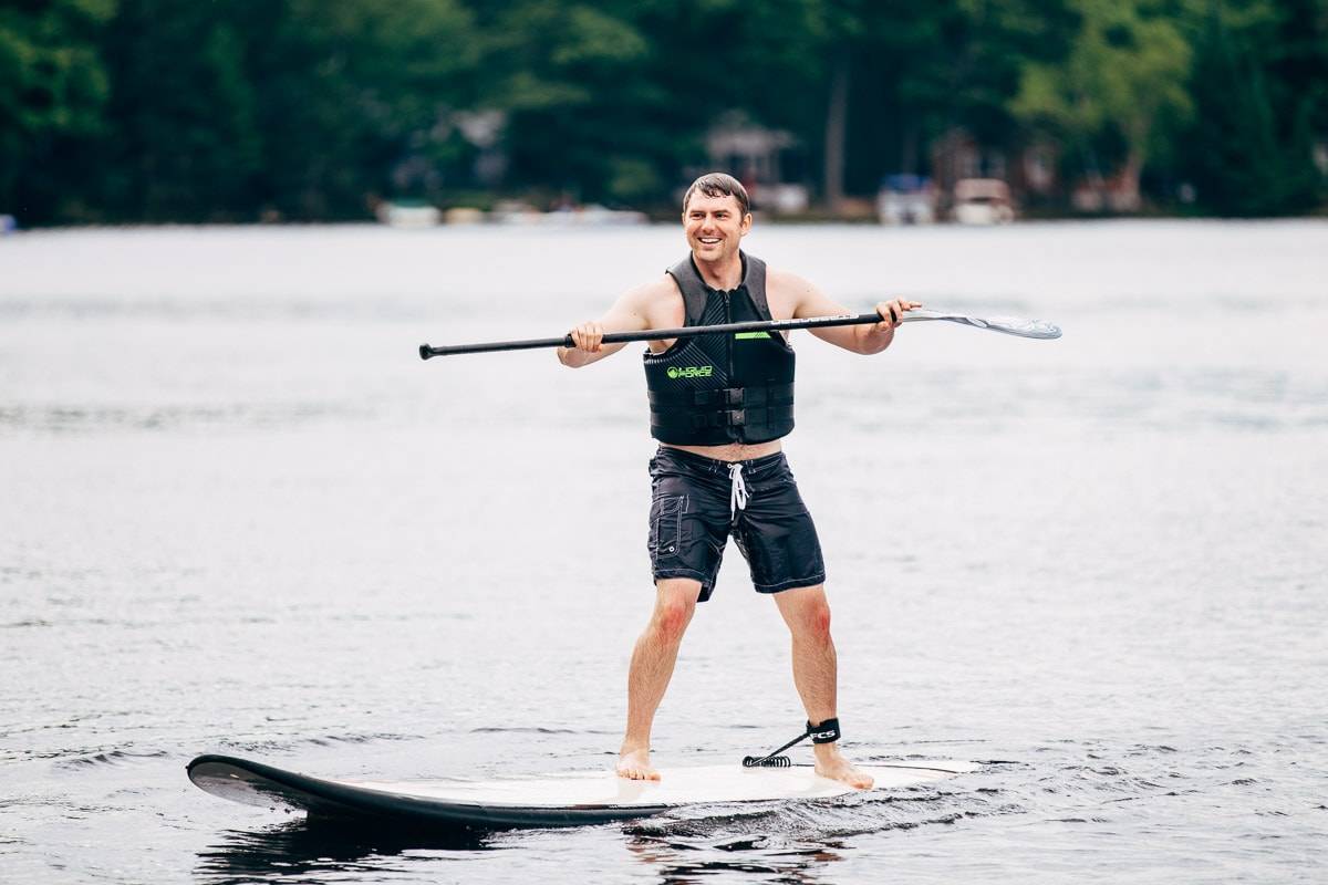 Man paddle boarding.