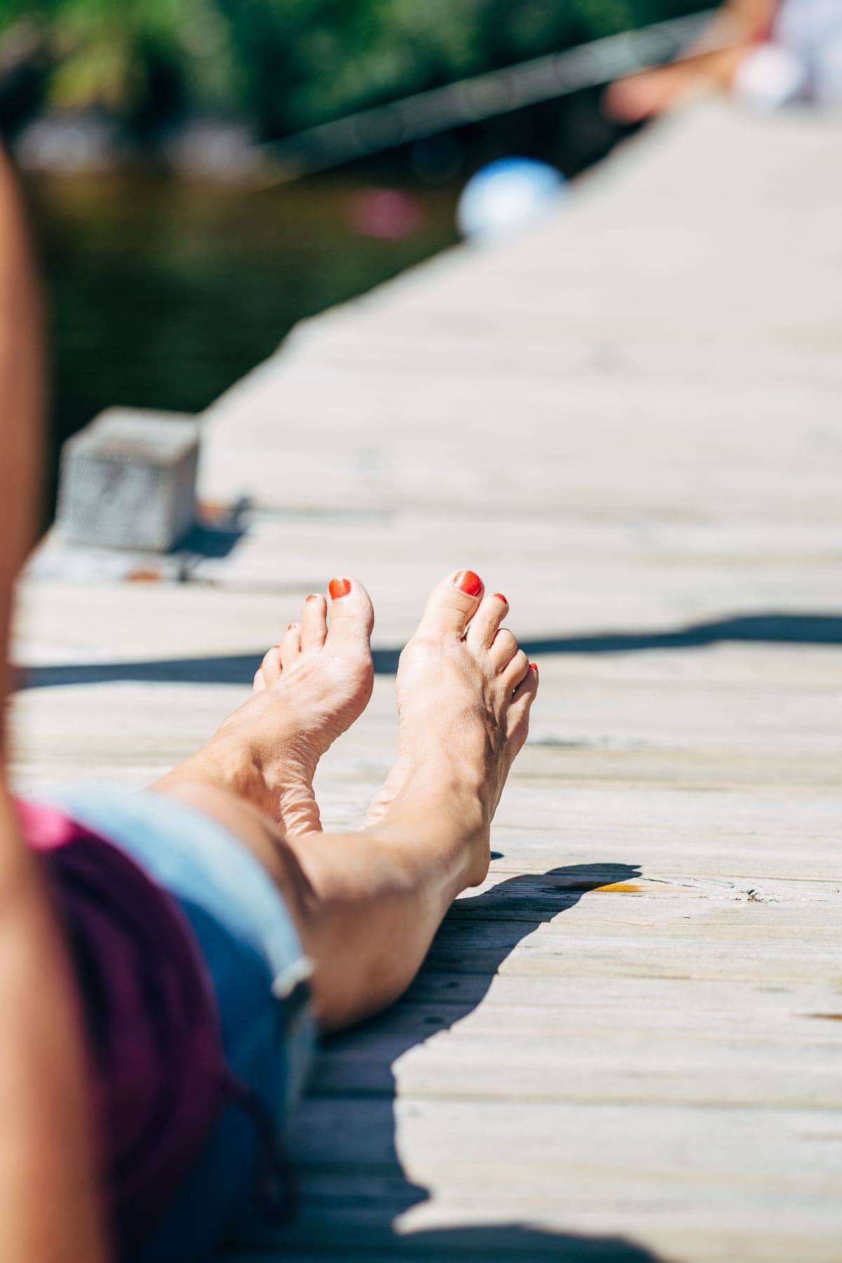 Feet on the dock.