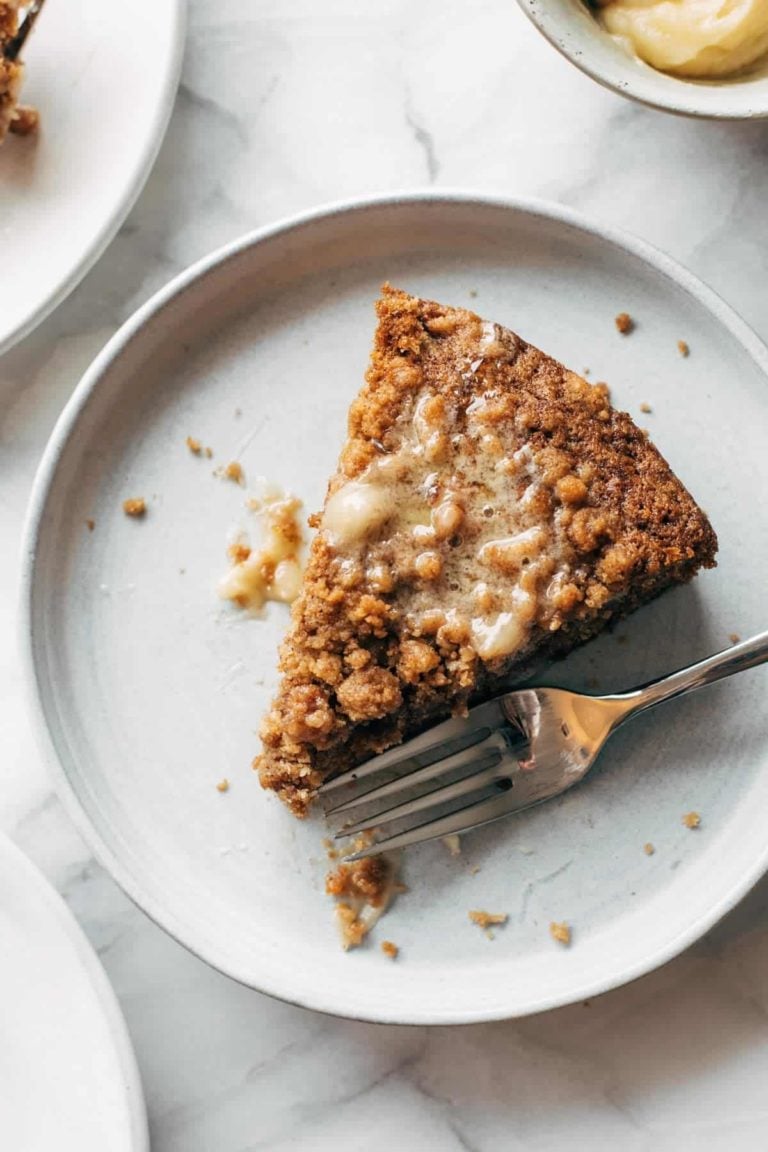 Carrot cake coffee cake on a plate with a fork.