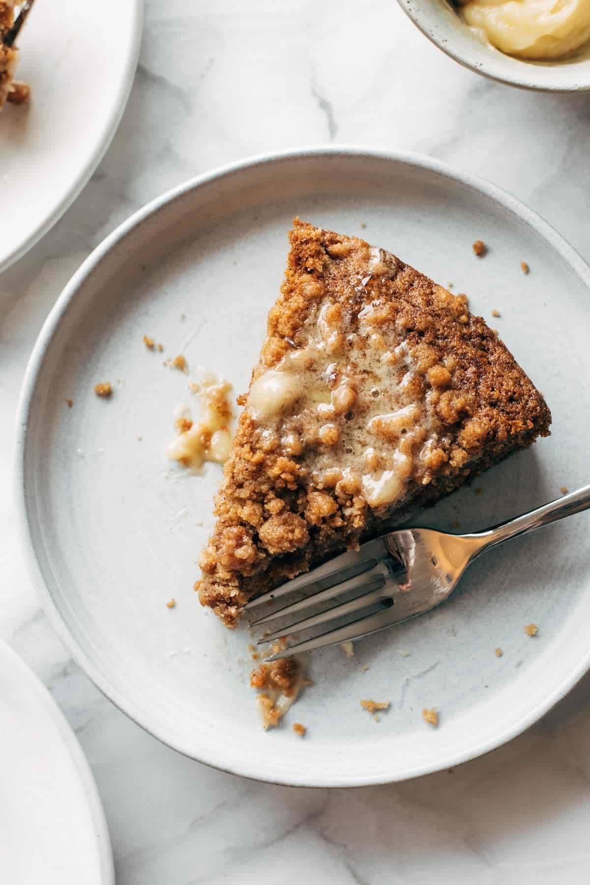 Carrot Cake Coffee Cake on a plate with a fork.