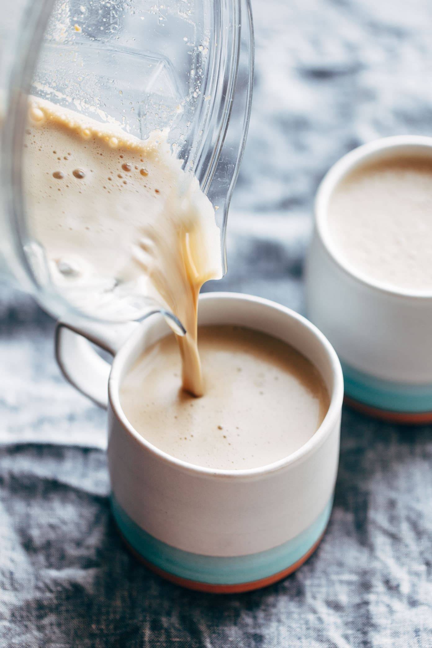 Cashew Coffee pouring into a mug.