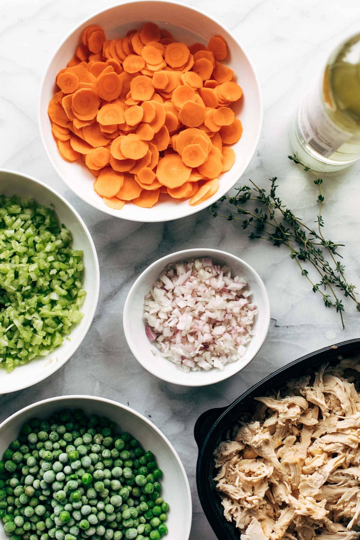 Ingredients for chicken pot pie with biscuits.