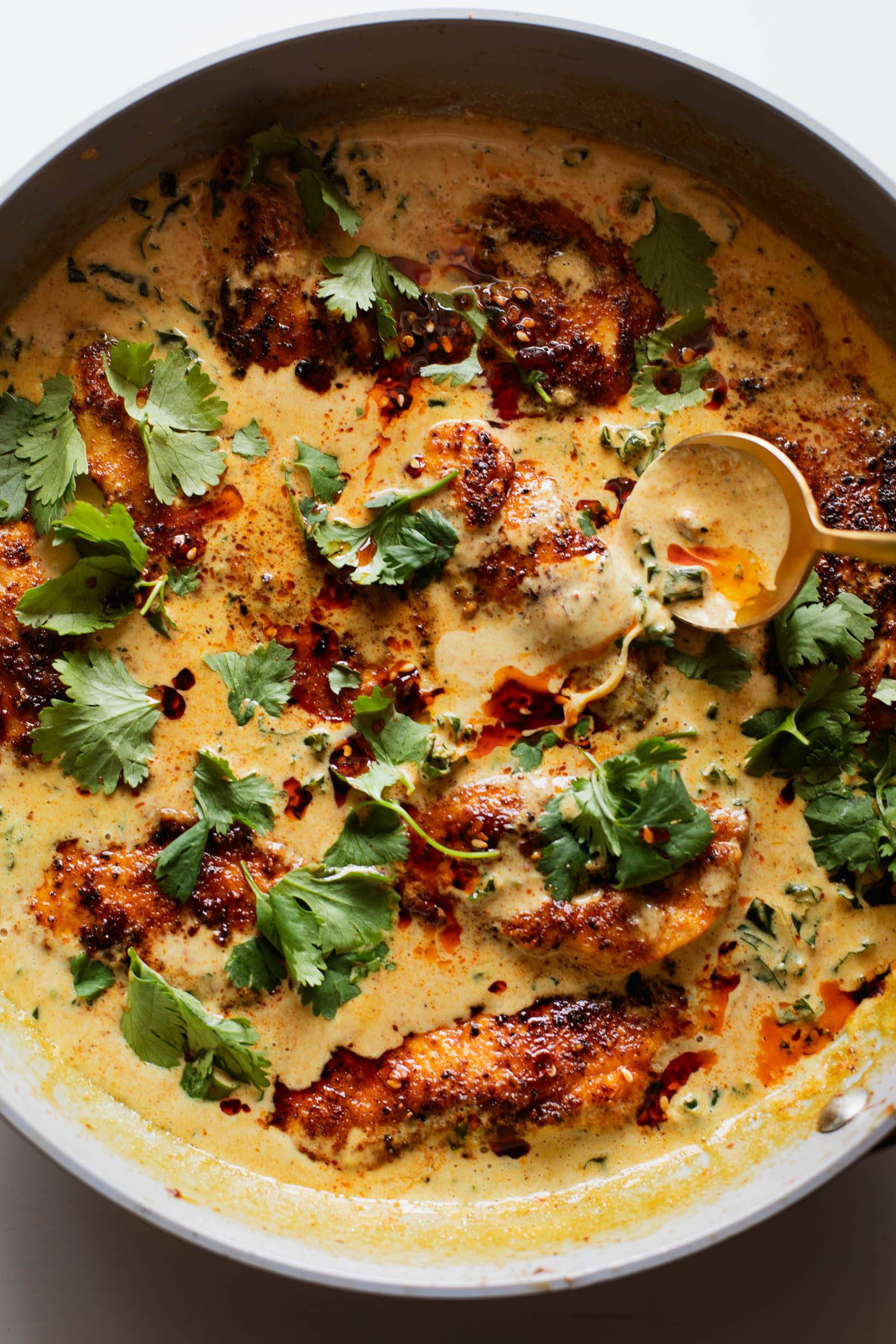 Chicken in a coconut sauce with kale.