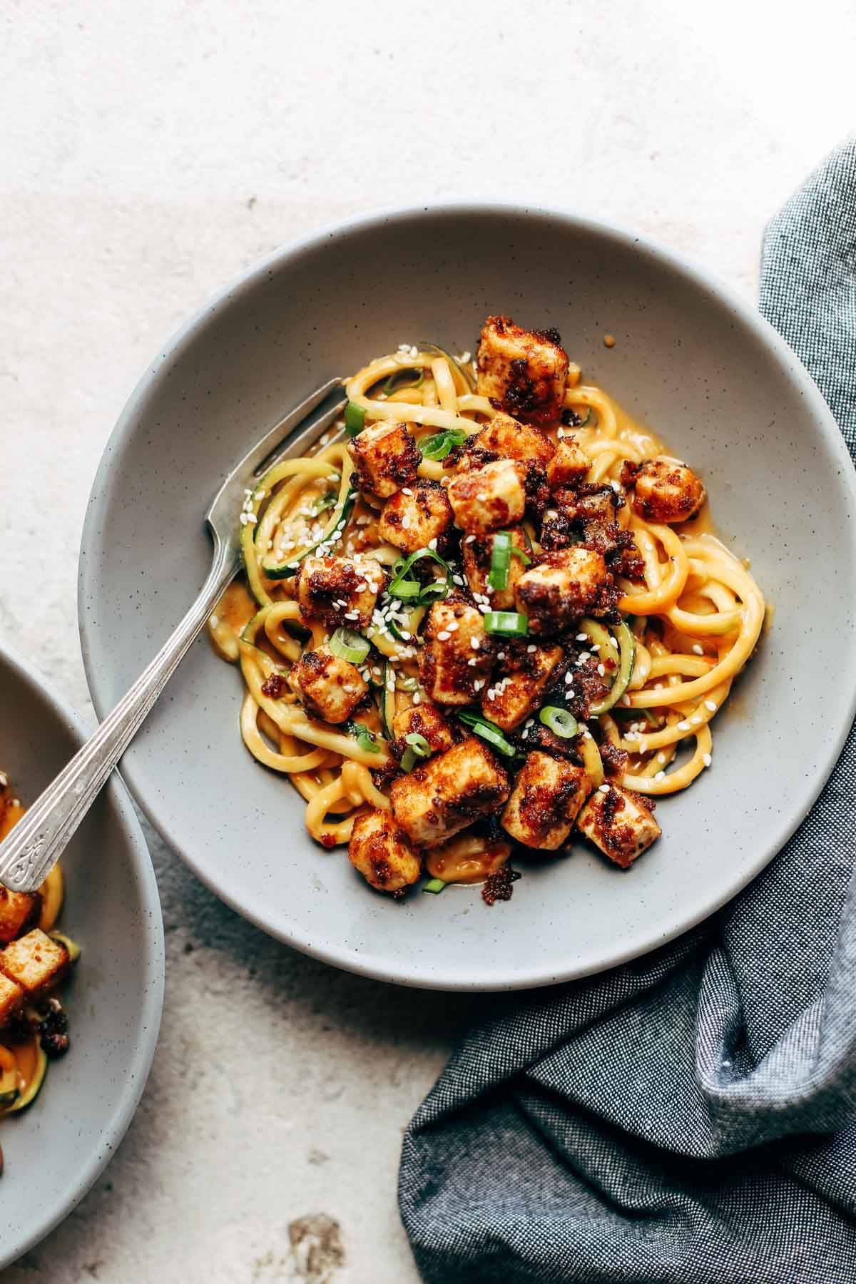 Zoodles in a bowl with tofu.