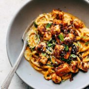 Sesame Zoodles wiht Tofu in a bowl.