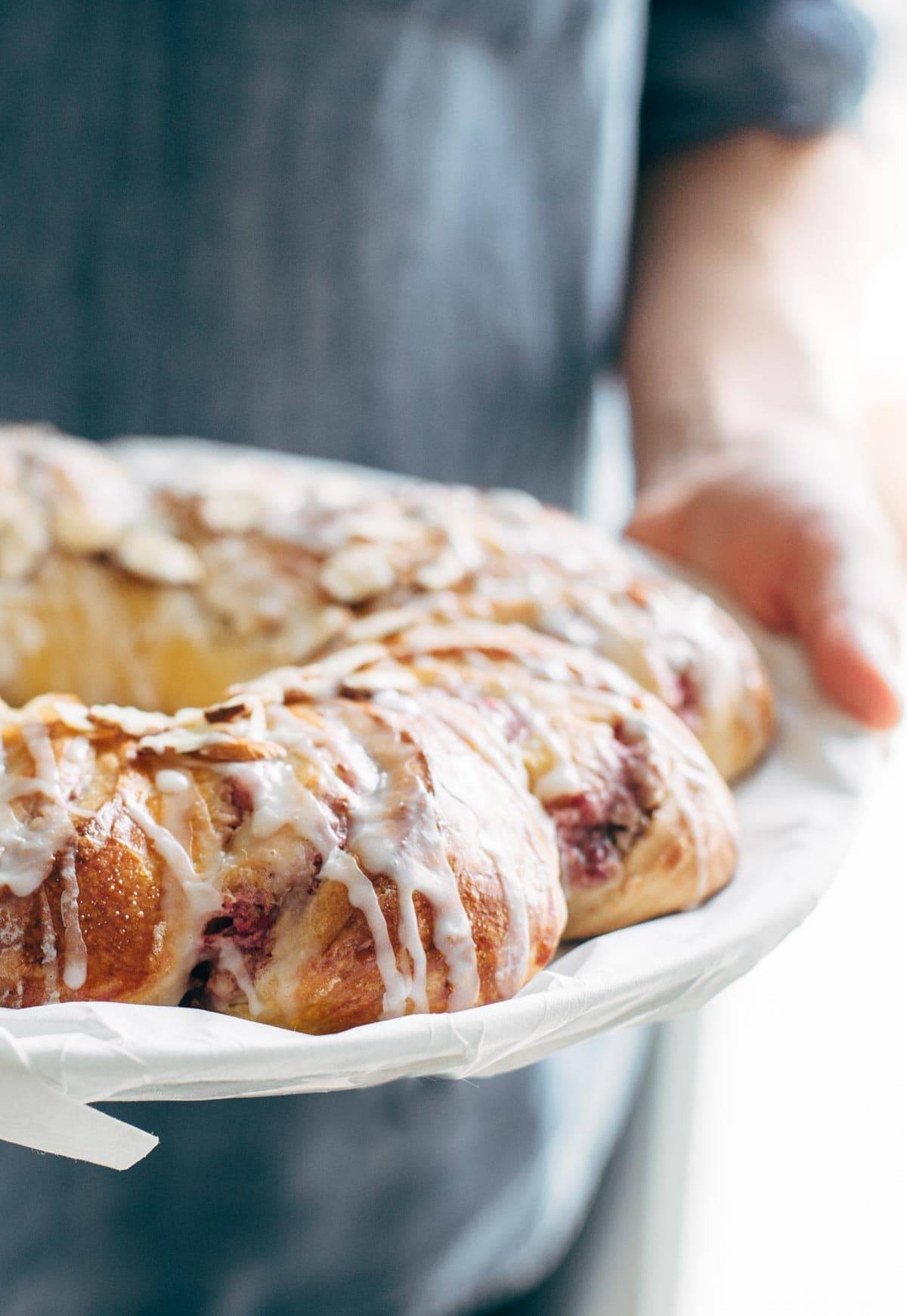 Christmas Tea Ring filled with Raspberry Cream Cheese Filling - the most beautiful Scandinavian-inspired recipe for holiday brunch! | pinchofyum.com