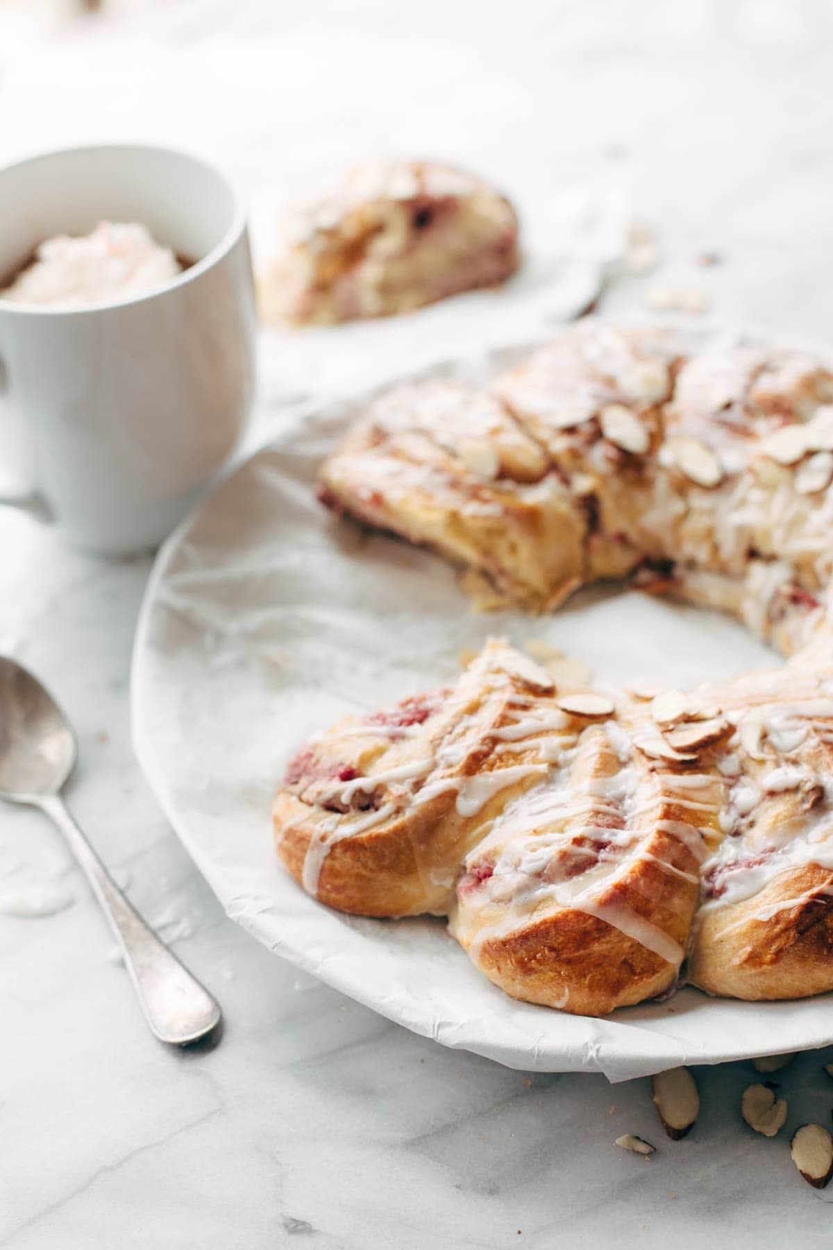 Christmas Tea Ring filled with Raspberry Cream Cheese Filling - the most beautiful Scandinavian-inspired recipe for holiday brunch! | pinchofyum.com