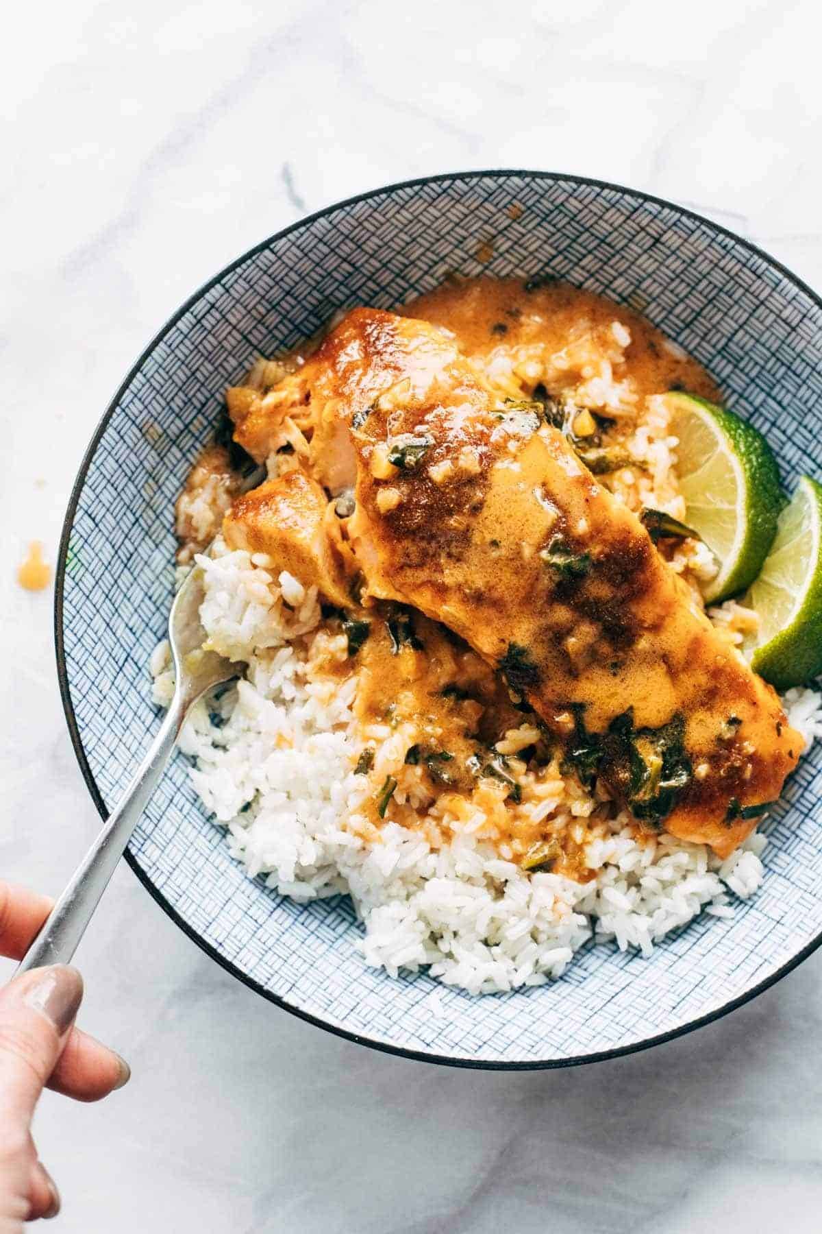 Coconut Curry Salmon with rice in a bowl.