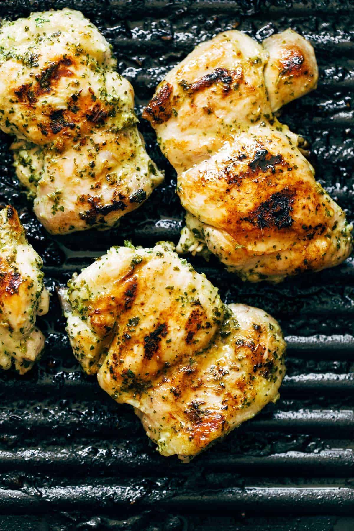 Grilling chicken on a grill.