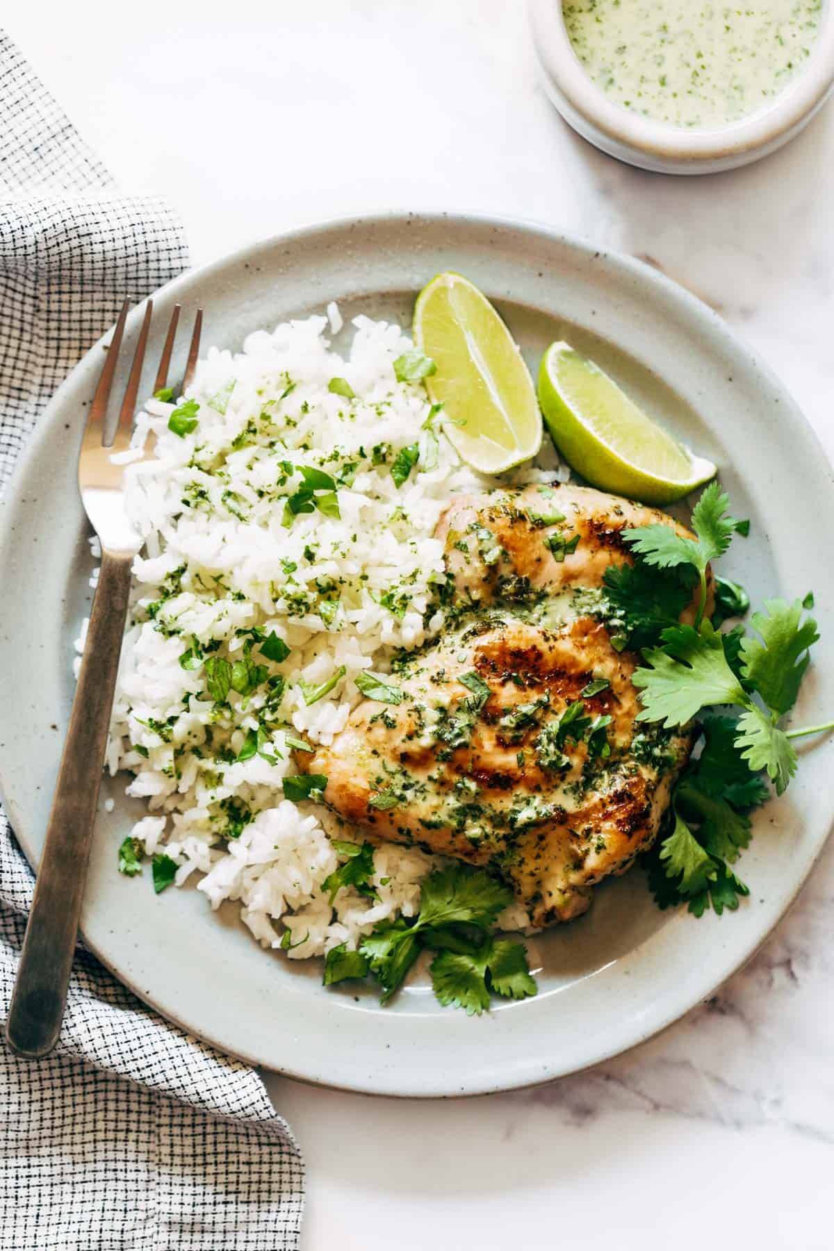 Coconut Lime Grilled chicken with rice on a plate.