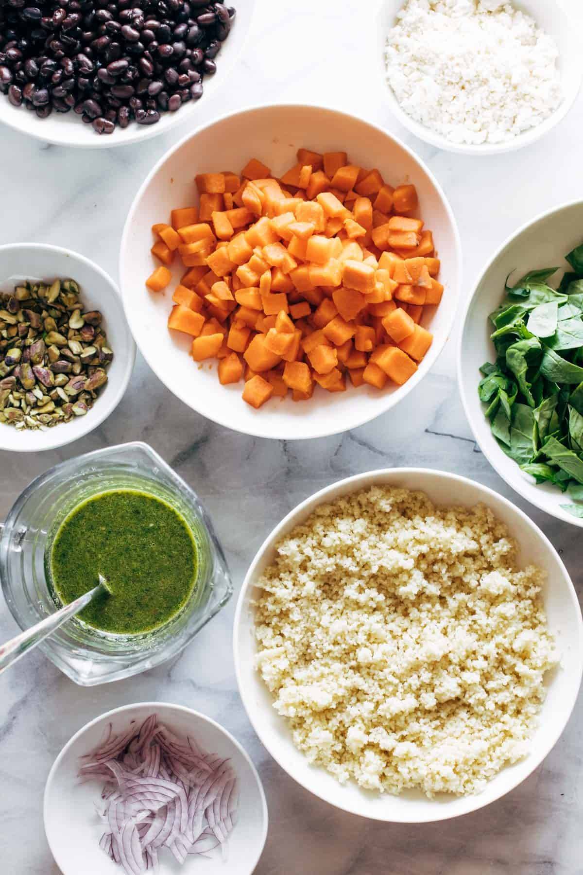 Ingredients in bowls for couscous salad.