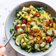 Detox Summer Salad in a bowl with fork.