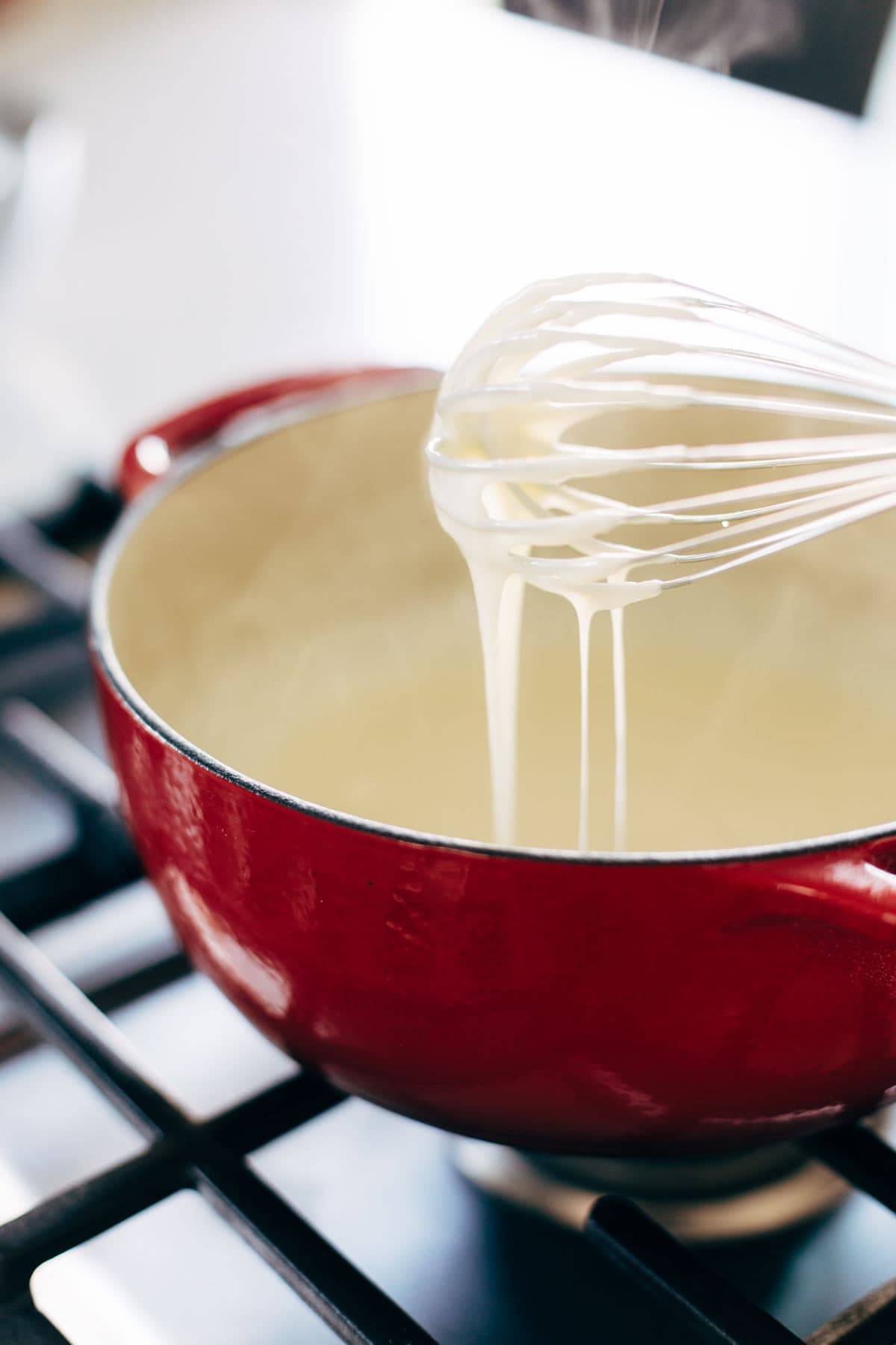 Cheese Fondue with a wisk