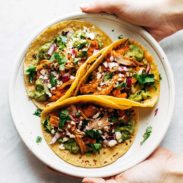 Chicken Tinga tacos on a plate.