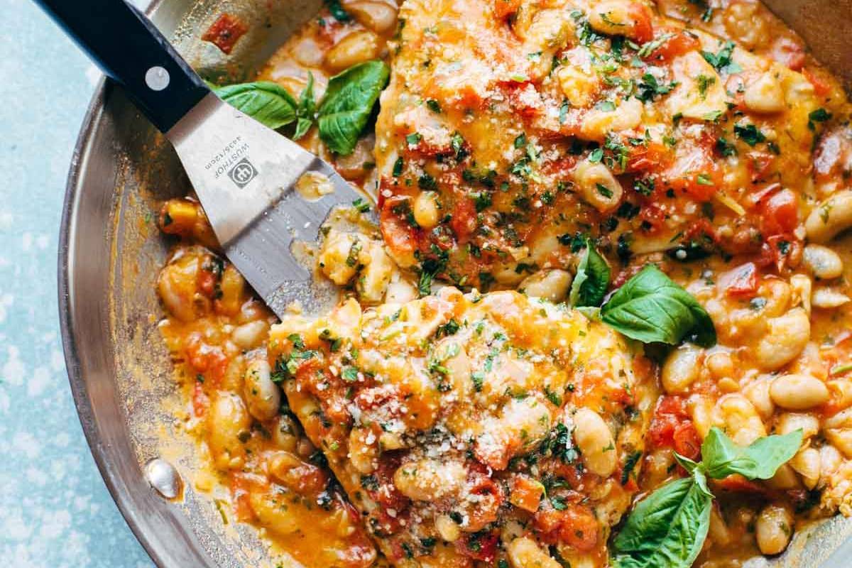 Slow-simmered tomato parmesan risotto paired with crispy fish.