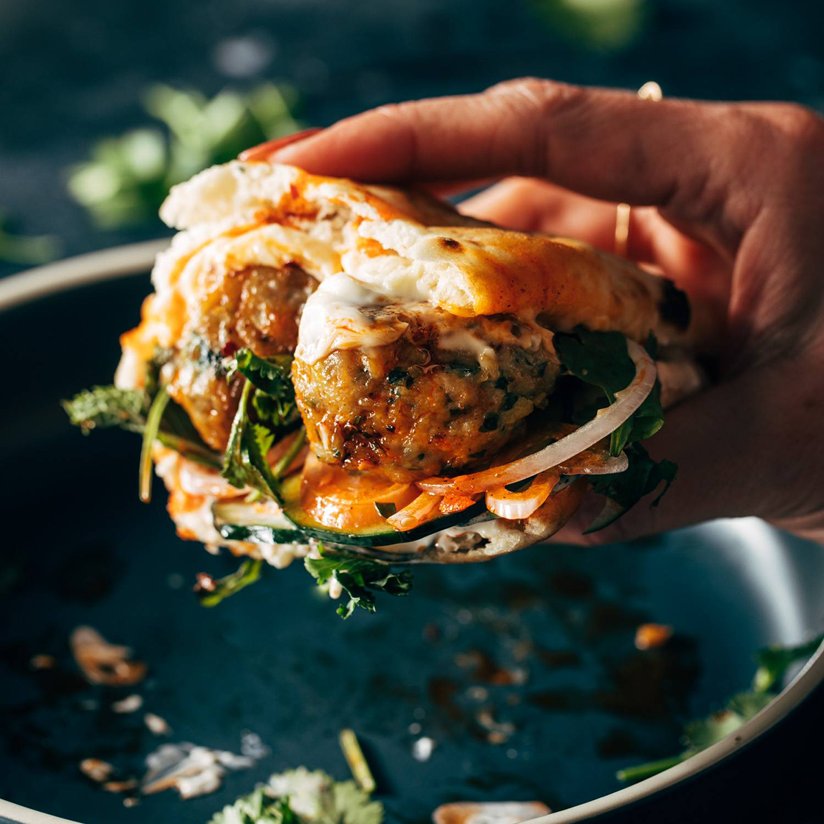 Ginger chicken meatballs in a naan sandwich.