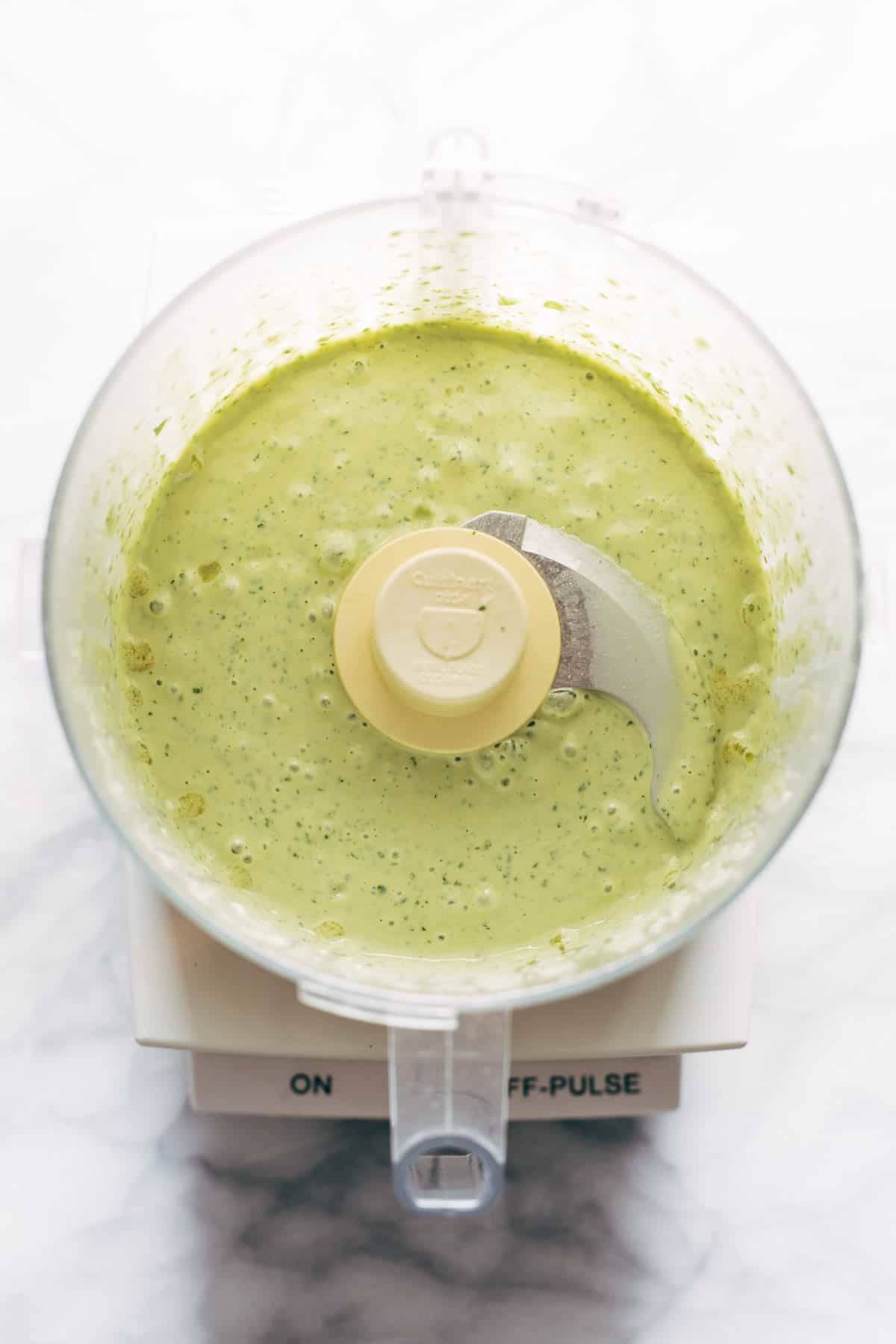 Green tahini in a food processor.